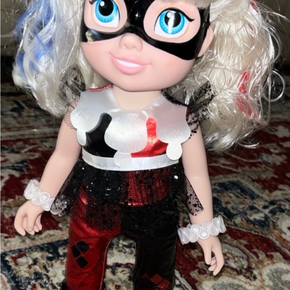 Charming Doll with Black, Red, and White Outfit